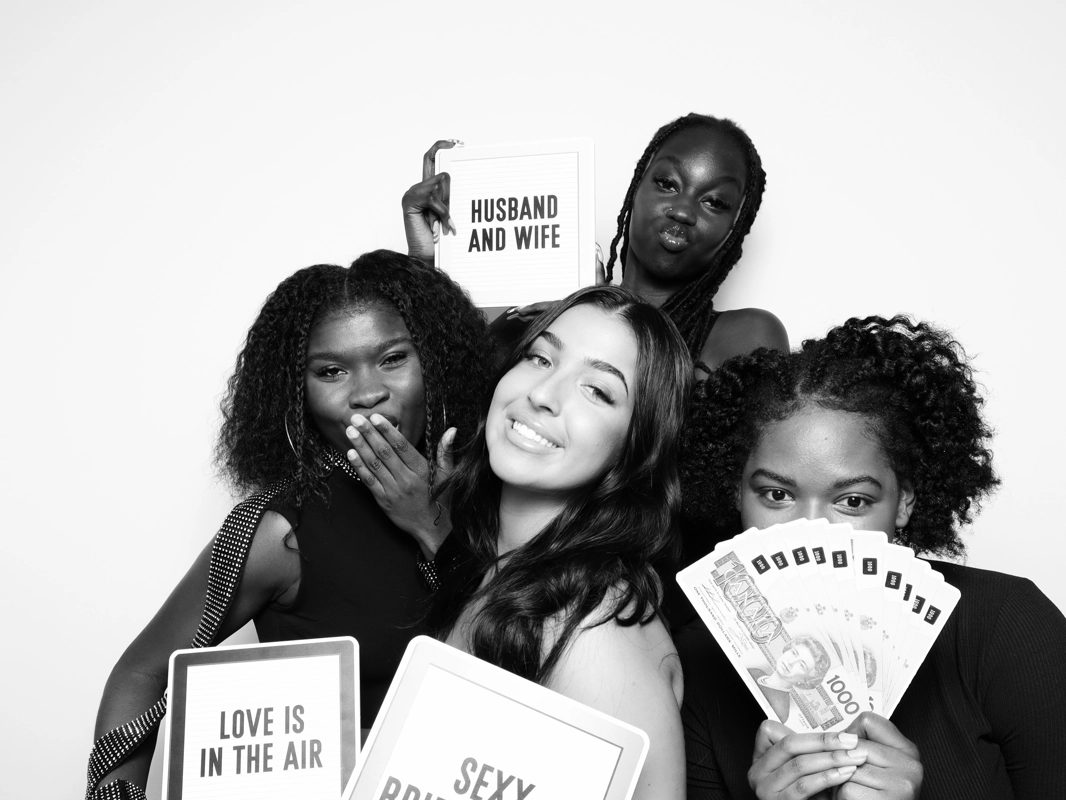 Group photo booth session with props
