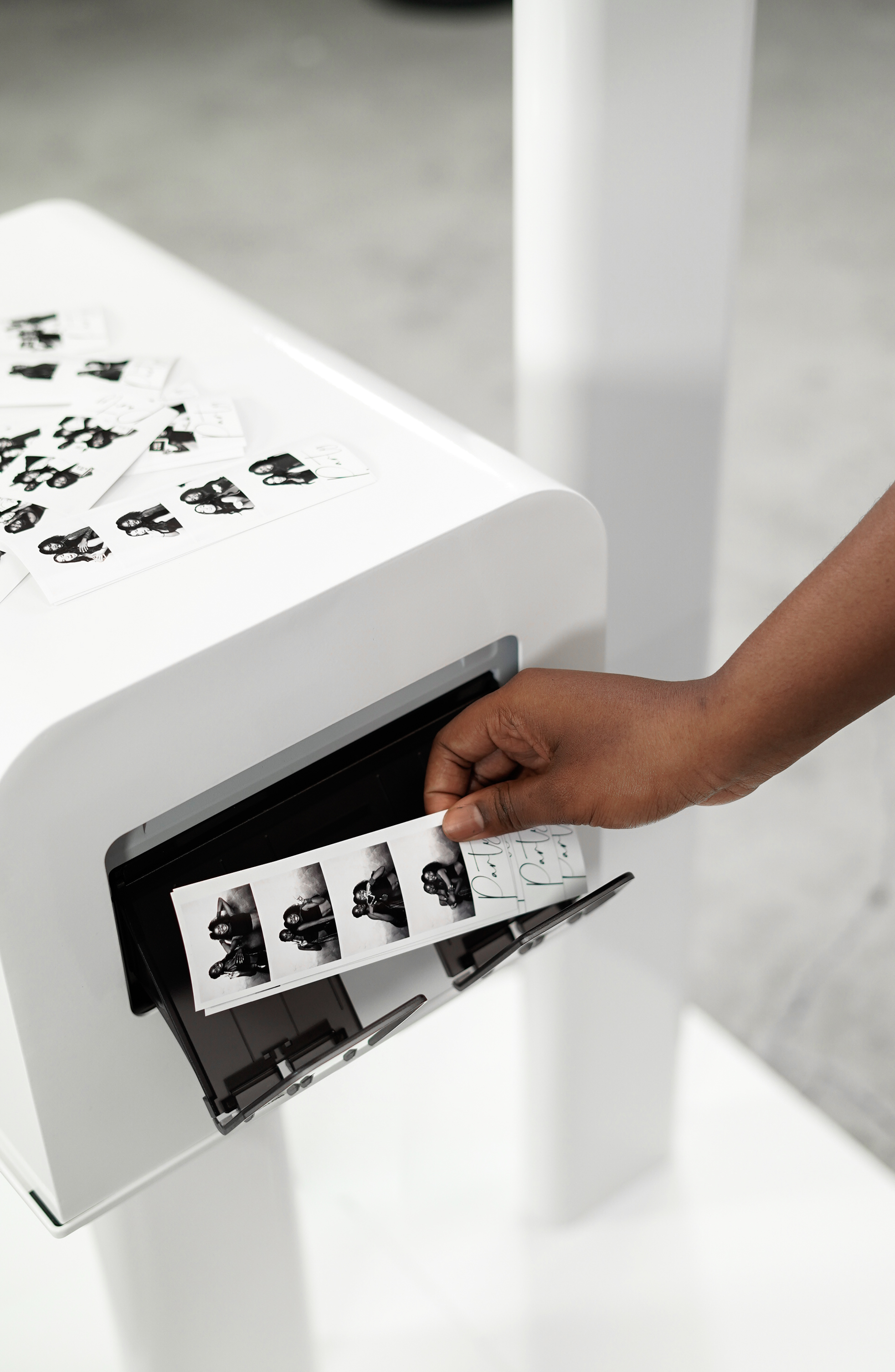 Photo strip printing from a photo booth printer